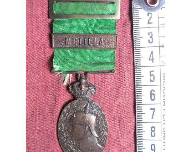 Medalla de Marruecos. Pasador Melilla. Creada en 1916: Catálogo de Antiga Compra-Venta }}